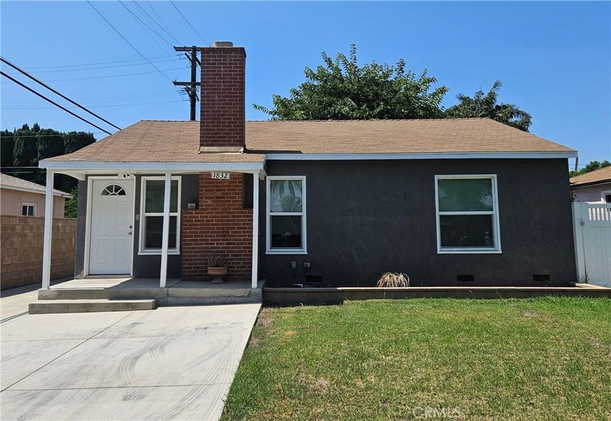 Bright sunny Updated mid century modern home with remodeled kitchen and bath, gleaming hardwood floors and newer stove, range hood , washer and dryer in inside laundry room. Fireplace in the living room,  built in cabinets and window seat in the dining room built in closets and drawers in the bedrooms. 2 car detached garage, with long drieway, extra parking space in front and large block wall fenced back yard with huge shade tree. Light neutral interior ready  for a new tenant.