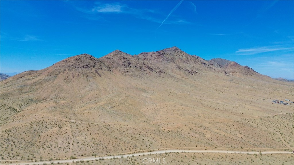 TWO PARCELS – 80 ACRES TOTAL | OFF-GRID MOUNTAIN LAND | BARSTOW, CA
Here’s your chance to own your very own mountain! This listing includes two 40-acre parcels, sold together for a total of 80 acres of land in Barstow, CA. The property is fully off the grid making it perfect for anyone looking for peace, privacy, and open space.
The land has hills, desert views, and lots of open space. It’s great for outdoor activities, camping, off-roading, or building a private getaway. It could also be a long-term investment. Property is also located in between the I-15 & 247 Hwy.