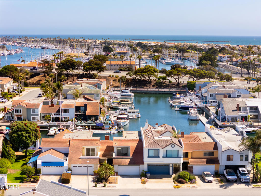 WATER VIEWS FROM EVERY ROOM! Channel Islands Harbor with Southern exposure boat dock. This property features a private 40' boat dock with space for all your watercraft--paddle boards, kayaks, or your dream cruiser. This home is a blank palette, ready for your remodel and personal vision, offering the rare opportunity to create a custom coastal retreat tailored to your taste. Enjoy daily sunsets, gentle breezes, and direct access to open water--all from your own backyard. Don't miss this chance to live the dockside dream! The Channel Islands Harbor has the most sought after weather in the world, located 35miles to Montecito to the north or Malibu is 35miles to the south.