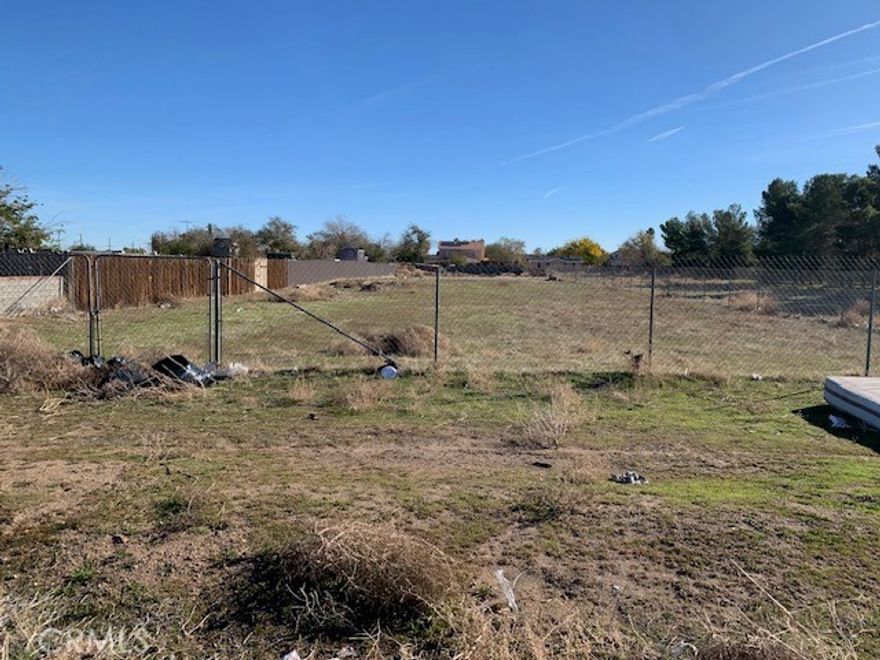 Investors Opportunity. Half of Acre Flat Land available near Palmdale Blvd with RN1 Zoning that Allows MINIMUM 6 houses or SFR or Townhouses to be Built and Max 10. Also Secondary Uses can be Places for Worship, Schools or Public Facilities. Great opportunity for a very Affordable Price. Lot is Flat and Fenced.....has Access thru 26th St E very Close to Palmdale Blvd. Must Sell, One of a Kind Opportunity!!!! Call for Details.