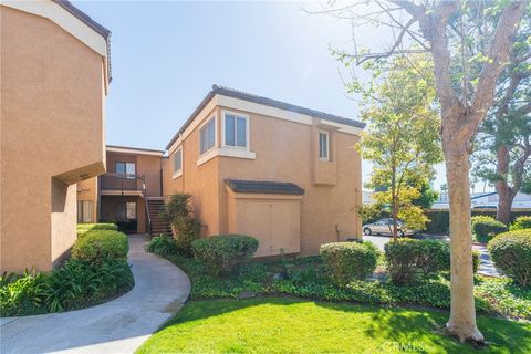 Photo of 7911 Woodlake Drive #77, Huntington Beach, CA 92647 (MLS # OC26037217)