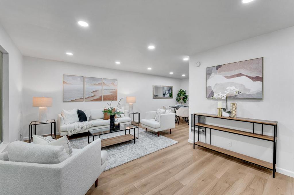 Step into this bright and beautifully remodeled West San Jose condo ideally located within the award-winning Cupertino Union and Fremont Union High School Districts. Zoned for De Vargas Elementary, Hyde Middle, and Cupertino High, this 2-bedroom, 1.5-bath home is a rare opportunity to own in a top-tier school district without the million-dollar price tag. Inside, you'll find new laminate flooring throughout, recessed lighting, fresh paint, and a brand-new skylight that fills the upstairs with natural light. The kitchen has been renovated with new countertops, refinished cabinetry, and stainless-steel appliances, opening to a spacious dining and living area perfect for entertaining or relaxing. Upstairs, the oversized primary bedroom offers direct access to the remodeled full bath, while the second bedroom is perfect for a kids room, guest space, or home office. Located just minutes from Santana Row, Valley Fair, and major tech employers like Apple, with easy access to highways 280, and 880 this home delivers the best of Silicon Valley living.