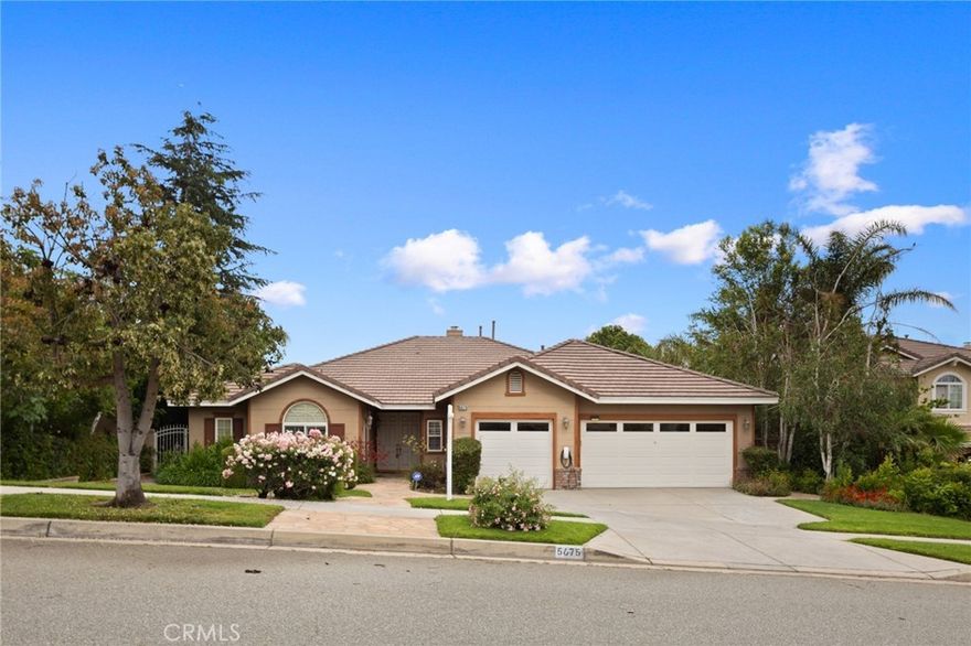 Welcome to this stunning single-story home in the prestigious “Masterpiece” community of North Etiwanda. From the moment you arrive, you'll notice true brilliance in design topped off with a harmonious interior and exterior color palette. This gem features 4 spacious bedrooms, 3 full bathrooms, and 2,905 sq ft of thoughtfully designed living space. Enter through a private courtyard and into an inviting interior adorned with vinyl flooring, 4-inch baseboards, and abundant natural light. The gourmet kitchen is a chef’s dream, boasting a large granite center island with bar seating, recessed lighting, a walk-in pantry, newer built-in appliances, and an adjacent casual dining area with easy access to the backyard. The family room is warm and welcoming with a gas/wood-burning fireplace, perfect for gatherings. The flexible layout includes a Jack-and-Jill bathroom connecting two of the secondary bedrooms, a guest-ready full bath with an updated walk-in shower, and a well-appointed office. The spacious primary suite offers private access to the backyard and features a luxurious en-suite with a tiled walk-in shower, soaking tub, quartz dual-sink vanity, and a walk-in closet with built-in shelving. Step outside to your private backyard retreat—ideal for entertaining or peaceful relaxation—with city light views, a covered patio, lemon tree, manicured shrubs, rose garden, built-in gas BBQ island, and a breathtaking view of the mountainside. Additional highlights include: a full-sized laundry room with ample cabinetry and a utility sink, an oversized driveway, a 3-car garage with built-in storage, and no rear neighbors—just views. All situated on a spacious 9,801 sq ft lot, minutes from top-rated Etiwanda schools, shopping, and major freeways.