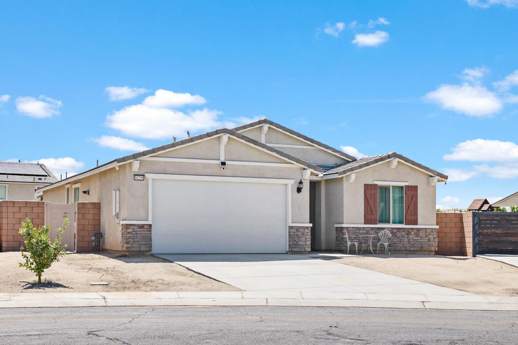 Welcome to this beautifully maintained newer 4-bedroom, 2-bathroom home, perfect for first-time buyers looking for comfort, space, and long-term potential. If you are thinking of an income generating property this one is for you as well. Step into a bright and open floor plan featuring a modern kitchen, generous living area, and well-sized bedrooms ideal for family living or a home office setup.The spacious primary suite includes a private bath and walk-in closet, offering the perfect retreat at the end of the day. The large backyard is a blank canvas--ready for your personal touch, whether it's a garden, play area, or outdoor entertaining space. Brand new patio cover has been added for confort and ready for family gaderings. Located in a friendly and well-established neighborhood, this home is close to parks, schools, and shopping centers. With its move-in ready condition and room to grow, this property is a fantastic opportunity to start your homeownership journey.