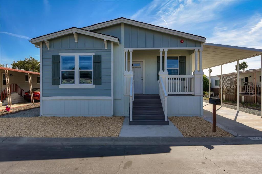 This beautiful 3 bedroom, 2 bath manufactured home located on a quiet street in the lovely 55+ community of The Tropics will not be on the market long! The Open Kitchen Concept has an Island, Tile BackSplash, Stainless Steel Appliances, Granite Counter Tops, Pantry! The master suite is situated privately away from the rest of the bedrooms toward the back of the home and enjoys generous Walk-In Closet, Dual Sinks, and a Walk-In Tile Shower with a Stainless Steel Shower Spa. The home's 2 bedrooms and full bath are roomy, bright, and has tons of space for storage.