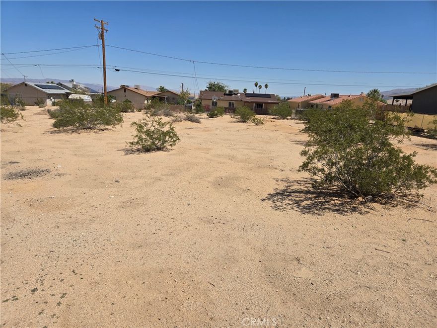 Discover the perfect slice of desert serenity with this .2-acre residential lot in Twentynine Palms. Nestled just minutes from the heart of town and a short drive to the iconic Joshua Tree National Park, this property offers the ideal balance of convenience and natural beauty. With utilities nearby, building your desert retreat is closer than ever. Whether you're looking to build a rental investment, or a full-time home under the stars, this lot is your blank canvas in the high desert.