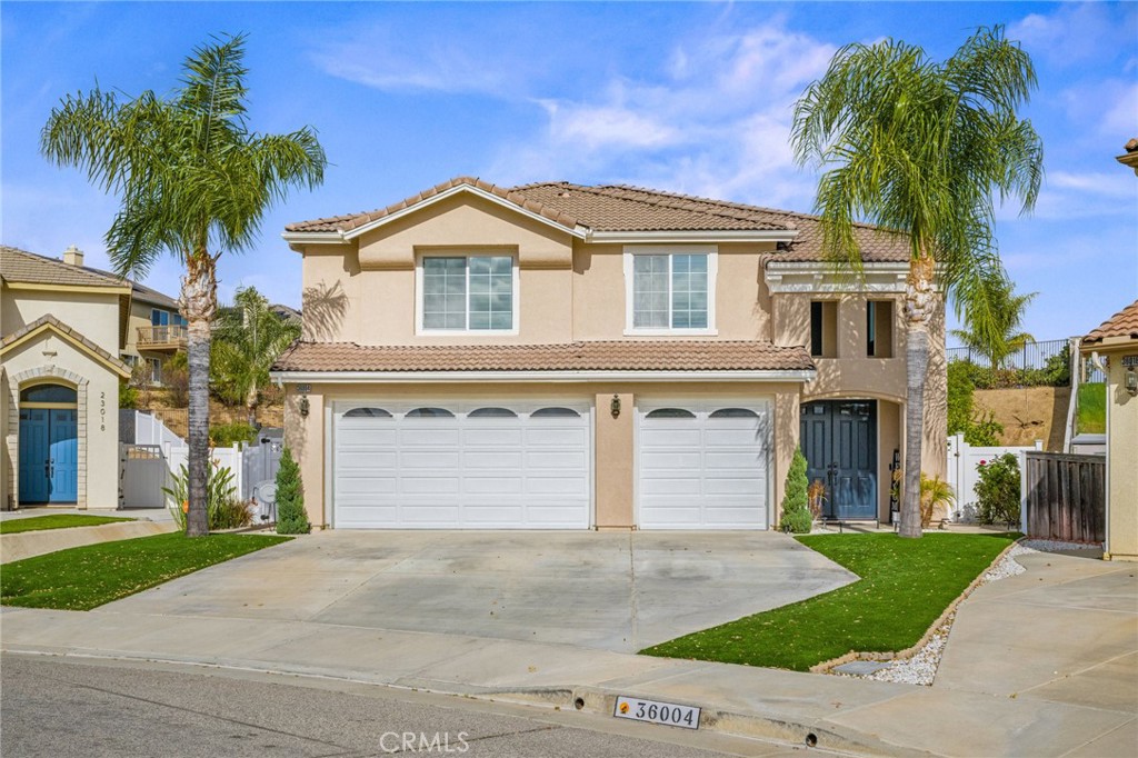 Welcome to your dream oasis! This beautifully updated home, nestled in a quiet cul-de-sac, boasts a bright and inviting interior, featuring soaring vaulted ceilings and expansive windows that flood the space with natural light. The main level offers a convenient bedroom and a full bath, perfect for guests or multi-generational living.
The heart of the home is the gourmet kitchen, centered around a spacious island, complete with a walk-in pantry and brand-new sinks and fixtures, including a built-in cup rinse for added convenience. Enjoy peace of mind with a whole-home water softener and filtration system, ensuring quality water throughout.
Step outside into your private paradise! The custom saltwater pool is a true centerpiece, featuring a swim-up bar, grotto, waterfall, slide, and a cozy fire pit overlooking the spa. Entertain effortlessly with an outdoor weatherproof TV and an app-controlled Intellitouch system, perfect for poolside gatherings. The backyard also features a three-hole chip-and-putt green, lush turf, and mature fruit trees, including pomegranate, citrus, and blood orange.
Enjoy the shade under the Alumawood patio cover, equipped with ceiling fans, lights, automatic power shades, misters.The EverLight color-changing lighting adds a festive touch for every occasion, all easily controlled via an app. , temperature sensor, and filtration system, along with new locking fence gates for added safety.
Retreat to the upstairs primary suite, which features a private balcony overlooking the stunning backyard. The spa-inspired ensuite bathroom offers dual sinks, a soaking tub, and a separate shower, creating a tranquil space to unwind. A spacious loft provides versatile options for a home office, playroom, or additional living area, while custom cabinetry and storage racks in the garage and custom closets in all bedrooms maximize storage.Recent upgrades include refinished hallway bedroom and downstairs hallway tub ,new upstairs air conditioner,Vivian paid alarm system activation is $41 a month and a newly glazed Fireplace,NO HOA and with owned solar panels this home has it all. Don’t miss your chance—this stunning property won’t last long!