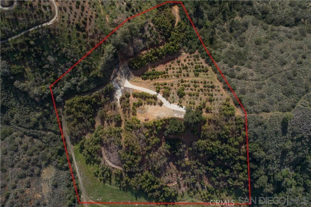 BUILD YOUR DREAM HOME WITH FOREVER VIEWS SURROUNDED BY AN OUTSTANDING AVOCADO GROVE! Check out this incredible land/grove parcel with sweeping and spectacular 360 degree views of the surrounding mountains, the valleys below and on a clear day the ocean in the distance! Offering 10.57 acres located in the prestigious area of De Luz in Temecula. Escape the city and build your dream home on this amazing avocado grove and estate property high atop a hill! And there is also plenty of room to build a guest house as well! The current owner has spent last two years dialing in this pristine yielding 10 acre, 800 tree avocado grove that lies outside the freeze zone and is irrigated by a top-of-the-line automatic timer-controlled high-volume 2-inch water pipe system. Take advantage of this impeccably maintained, professionally managed farm with exceptional production and potential for additional planting or development of a spectacular estate home. Located in the heart of the avocado capital of the world, the owner has also recently planted 150 new Dusa rootstock Haas avocado trees! The results are impressive! Additional features include a professionally graded driveway down below, 100 foot concrete driveway up to the pad, 800+ sf concrete patio at the top, 40' container, dozens of ancient oaks, utilities at the street and a flat 1 acre pad large enough to build an outstanding estate home, will take your breath away and make every day a vacation! With daily coastal breezes, the climate in De Luz is nearly perfect and suitable for growing almost anything.