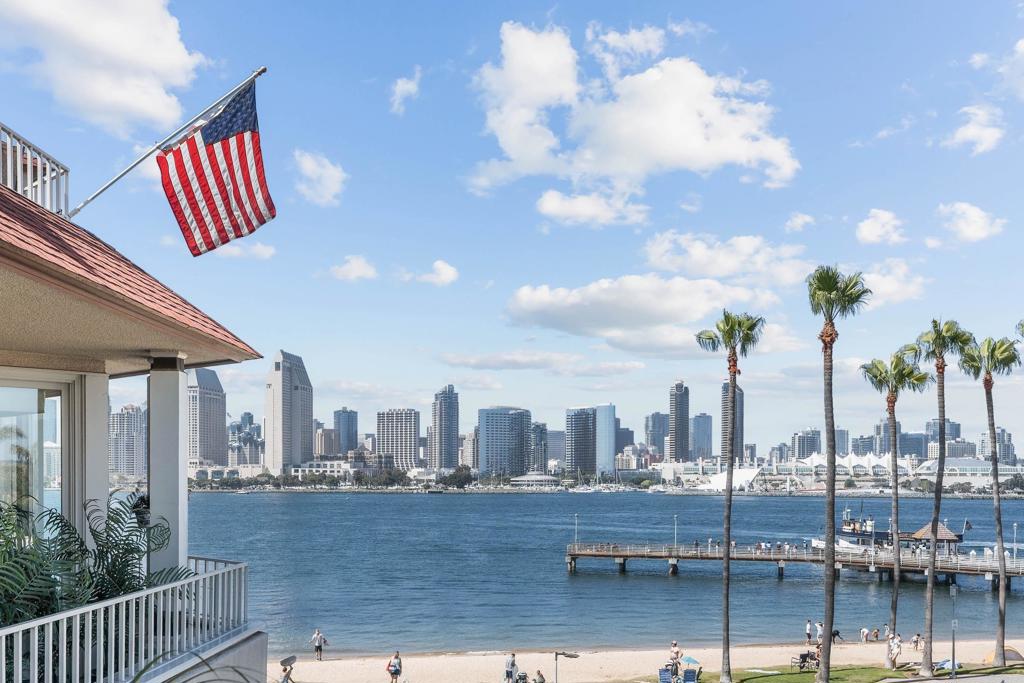 Welcome to your dream Bayfront coastal retreat in one of the most coveted locations in Coronado - The Point at Coronado Village! This expansive 3rd-floor condo at The Point offers unmatched panoramic views of the San Diego Bay, Downtown skyline, Coronado Bridge, and Ferry Landing —all from the comfort of your home. The Point offers one of the most accessible communities on the Island, within one of Coronado's most secure and well managed associations. Spanning 2,368 sq. ft. of single-level living, this 3-bedroom, 3 bath home features a spacious, open floor plan designed to maximize natural light and take full advantage of the surrounding scenery. The beautifully updated interior includes hardwood floors, new paint throughout, new carpet in the primary bedroom and more. The chef’s kitchen offers high-end appliances including a ‘Viking’ range, granite countertops, custom cabinets and wet bar. Floor-to-ceiling sliding glass doors extend the living space onto a private wraparound balcony—perfect for entertaining or simply soaking in the views. The luxurious primary suite features direct balcony access, a spa-like en-suite bath with an adaptive soaking tub, dual vanities, and generous walk-in closet. Two additional large bedrooms, two full bathrooms and laundry room complete the remaining interior. Community amenities include two secure, underground parking spaces, private storage unit, Bayfront pool & spa, fitness center with sauna, and clubhouse. Enjoy the best of Coronado living with easy walkable access to the vibrant Coronado Ferry Landing with an abundance of shops, restaurants, and cafes. Adjacent to Centennial Park and the shops, restaurants and groceries along Orange Avenue. Opportunities like this rarely come along!