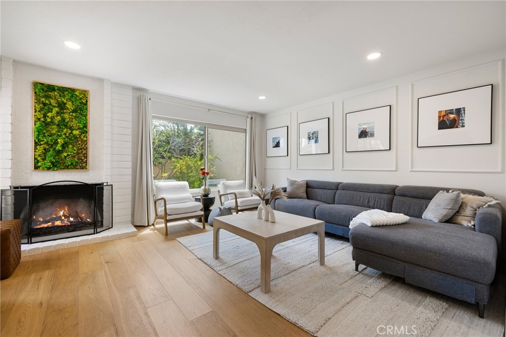 Welcome to 8396 Goldsport Circle, a stunning and completely remodeled home nestled in a peaceful and sought-after Huntington Beach community. This beautifully updated residence offers 3 spacious bedrooms, 3 modern bathrooms, and 1,658 square feet of thoughtfully designed living space—perfect for families or anyone seeking turnkey comfort and style. Step inside and immediately appreciate the warmth and sophistication of brand new hardwood flooring that flows throughout the entire home. The expansive layout is filled with natural light and enhanced by stylish new light fixtures, creating a bright and welcoming ambiance. The updated kitchen features brand new appliances, sleek countertops, and ample cabinetry, making it both functional and visually appealing—ideal for daily living and entertaining. All three bathrooms have been fully remodeled with contemporary finishes, including a spa-like primary bath that showcases a sleek standing bathtub and elegant fixtures. Additional upgrades include a whole-home water softener system, a new water heater tank, a brand new furnace, and new double-pane windows on the first floor for added energy efficiency and comfort. What truly sets this home apart is its location within a community that offers a rare combination of serenity and amenities. Surrounded by lush greenery and peaceful walkways, the neighborhood provides a true sense of community living. Residents enjoy access to a sparkling pool and spa, as well as a small clubhouse—ideal for relaxing weekends or casual get-togethers. The location is unbeatable—just 15 minutes from both the beach and the mountains, offering endless options for recreation and exploration. Families will also appreciate its proximity to top-rated schools, including the highly regarded John H. Eader Elementary School. Additionally, the area is known for its rich cultural diversity and vibrant dining scene, with a wide variety of authentic restaurants nearby, from Japanese and Vietnamese to Chinese, American, and more. 8396 Goldsport Circle is more than just a remodeled home—it’s a lifestyle opportunity in one of Huntington Beach’s most desirable communities. With every upgrade thoughtfully completed, all that’s left to do is move in and enjoy.