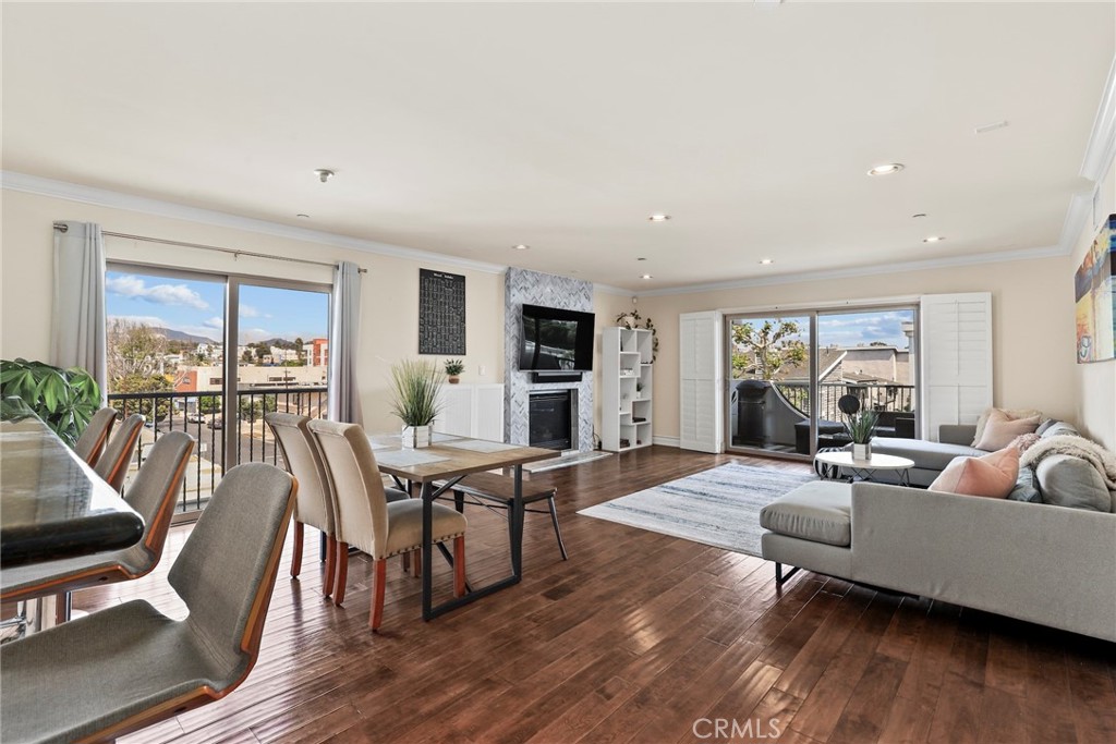 Proudly presenting this top-floor penthouse corner unit in West Los Angeles! Spanning 1,813 sq ft, this 3-bedroom, 2.5-bath home is front-facing and flooded with natural light, offering nice panoramic views. The spacious primary suite features two walk-in closets plus an additional sliding door closet, along with a luxurious en-suite bath complete with a glass-enclosed shower and separate soaking tub. The open kitchen provides generous counter space, stainless steel appliances, a barstool seating area, and flows seamlessly into the living and dining areas. Enjoy elevated living with two Juliet balconies, recessed lighting, a cozy fireplace, central heat/air, and in-unit laundry. Community amenities include a fitness center/ recreation room (under construction), sun deck, gated parking (2 assigned spots) and earthquake insurance. Situated just moments from Sawtelle area, Santa Monica Blvd, Westwood Village, UCLA, and iconic Westside beaches, this home offers the perfect combination of comfort, convenience, and style.