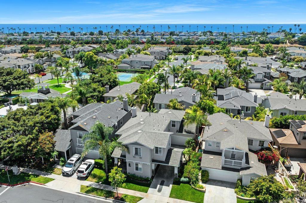Tucked behind the gates of the exclusive Waters End enclave and hitting the market for the first time since an extensive 600K remodel in 2020, this coastal-inspired showpiece is just blocks from beach access. Sunset strolls and surf sessions are a daily pleasure in this prime location. Inside, the thoughtfully reimagined floor plan features high-end upgrades throughout: eight-foot shaker doors with polished nickel Emtek hardware, a custom white oak staircase paired with matching wood flooring, and shiplap detailing that elevates every room. The kitchen impresses with expansive custom cabinetry, paneled appliances, polished nickel fixtures, and complementary brass hardware. Function meets elegance in the spacious new laundry room and a dedicated home office designed for comfort and productivity. The primary suite is a sanctuary, complete with a walk-in closet tailored for those who value impeccable organization. Enjoy exclusive community perks, including pool access, a playground, a dog park, and RV parking all behind the gates. Proximity to the 5 Freeway and Coast Highway makes daily travel a breeze, while grocery stores, resort-style hotels, and golf at Aviara, La Costa, and The Crossings are just minutes away. Whether you’re looking for a turnkey beach retreat or a luxurious summer rental, this home delivers coastal living at its finest.