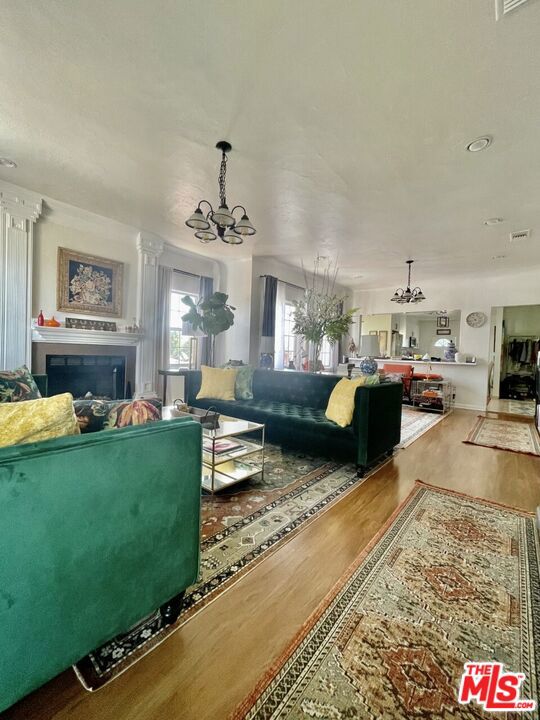 TOP FLOOR, light & bright, HUGE 3 bedroom/2 bath home w/ DESIGNER FINISHES, top of the line stainless steel appliances, & ULTIMATE CHEFS KITCHEN. COMPLETELY REMODELED KITCHEN w/ center island, STAINLESS STEEL APPLIANCES, quartz counter tops. This home has city views, huge bedrooms, big open kitchen, & NEWER APPLIANCES. Brand new light fixtures, recessed lighting, ample closet space, and ENORMOUS MASTER BEDROOM with walk-in closet. ***CENTRAL HEATING AND AIR CONDITIONING*** WASHER & DRYER IN UNIT!! Enjoy the oversized living room with views of the treetops and the city. Covered parking, large backyard. Centrally located, minutes to The GROVE & EASY FREEWAY ACCESS. Adjacent to Culver City & PicFair Village, walk to thriving boutiques & restaurants.