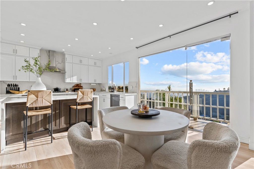 Exquisite Sunset Plaza View Estate for Sale. Discover this tastefully re-designed West Hollywood Hills estate, perfectly positioned high on Sunset Plaza Drive with breathtaking panoramic views stretching from city to ocean. The residence boasts views an open-concept floor plan with refinished beamed high ceilings, hardwood floors throughout, a cozy fireplace, and recessed lighting. The inviting living area seamlessly flows into the dining space and chef’s kitchen, complete with stone countertops, a waterfall island, sleek cabinetry, and new Viking appliances. Floor-to-ceiling windows and glass doors flood the home with natural light and open to two expansive terraces, perfect for entertaining or relaxing while taking in the views. The spacious primary suite offers a private terrace, walk-in closet, and spa-inspired bath featuring a spa shower, jacuzzi tub, and double vanity. Adjacent are two guest bedrooms plus a dedicated gym. Additional features include a two-car garage with direct home entry, in-home laundry, and smart home technology. There's plenty of room for a pool addition and additional build out space opportunities.
2019 Sunset Plaza Dr. is just minutes from world-class dining, shopping, and entertainment. School locater tool shows in the Wonderland Avenue Elementary school district. Property blends comfort, style, and prestige in one of the city’s most desirable neighborhoods.