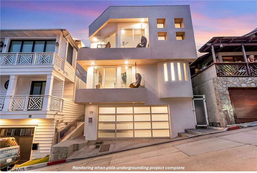 YOUR PRIVATE ARCHITECTURAL CONTEMPORARY BEACH HOUSE AWAITS!  BREATHTAKING, PANORAMIC 180-DEGREE WHITE WATER AND COASTLINE VIEWS FROM MALIBU TO PALOS VERDES! MAJOR REMODEL RENOVATION COMPLETED 2021! MODERN FLOORPLAN, ELEVATION AND DESIGN! PREMIUM LOCATION IN THE SAND SECTION OF MANHATTAN BEACH, JUST FOUR HOUSES UP FROM THE STRAND, JUST STEPS TO THE BEACH & BOARDWALK YET ELEVATED TO GIVE YOU THE MOST INCREDIBLE PANORAMIC VIEWS, THE PERFECT LOCATION! 'BRUSH-FREE NEIGHBORHOOD!' JUST MINUTES TO LAX! Luxury and effortless BEACH LIVING converge at 129 Moonstone Street, architecturally stunning, with TEN FOOT CEILINGS, contemporary (2,143 SQ FT) SINGLE FAMILY HOME. (NO HOA!)  This rare residence sits quietly WEST OF HIGHLAND on a PRIVATE and QUIET STREET offering the ultimate in exclusivity and tranquility.  Inside, nearly every inch has been thoughtfully reimagined for modern luxury, from the ten-foot ceilings and walls of glass to skylights to the wide-plank white oak hardwood floors and designer finishes throughout.  The sun-lit, open-concept floorplan is ideal for sophisticated entertaining or laid-back coastal beach days, featuring a state-of-the-art chef's center island gourmet kitchen with quartzite stone countertops, Viking and Sub-Zero appliances, a wine fridge, dry bar with ice maker, and a seamless transition to indoor/outdoor dining on one of four private balconies.  Retreat to the palatial primary suite with marble fireplace, TWO WALK-IN CLOSETS, spa-like bath with freestanding tub and oversized shower.  ALL THREE BEDROOMS ARE ENSUITES and OVERSIZED with lavish, modern baths, and an additional versatile DEN/OFFICE ADDS flexible space for work or guests.  Enjoy peace of mind and effortless living with a fully integrated SMART HOME SYSTEM--security, cameras, Sonos whole-home sound, lighting and climate--all controlled via Apple HomeKit.  Additional highlights include a built-in marble fireplace entertainment center in living room, interior laundry room, tankless hot water heater, whole-home filtration and softener, central A/C and heat, recessed and under-cabinet lighting and ceiling fans throughout.  The finished two-car garage with Tesla charger and extra storage adds convenience, while a city-funded undergrounding project (now in Phase 3 of 4 phases), promises future value and EVEN BETTER panoramic white water and coastline VIEWS! CAN BE SOLD FURNISHED. CONCESSIONS.