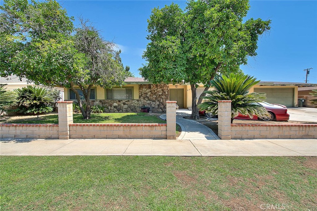 Welcome to 5737 Riverside Ave in the heart of Rialto! This spacious 4-bedroom, 2-bath home offers 2,080 square feet of potential on a generous 11,520 square foot lot. Inside, you’ll find large bedrooms, a family room with a cozy fireplace, a separate living room (currently used as a 5th bedroom), a formal dining area, and a big kitchen with plenty of cabinetry.
The home features central air and heat, a 2-car garage with backyard access, and block wall fencing all around for added privacy. The large backyard includes a covered patio—perfect for entertaining or relaxing.
While the home does need some TLC, it offers great bones and plenty of space to make it your own. Conveniently located near freeways, schools, and shopping centers. Don’t miss this opportunity to add your personal touch and bring out this home’s full potential!