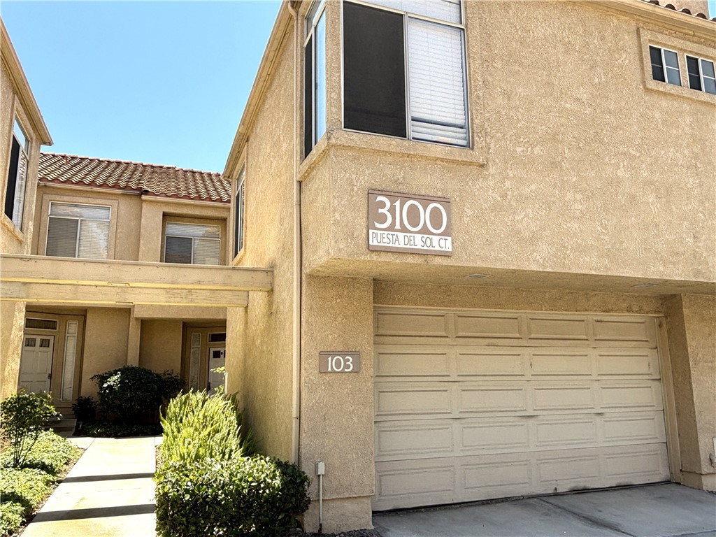 Gorgeous home features 3 Bedroom, 2 1/2 Bath, Immaculate LOOK LIKE NEW from the front to the back. Unit located on west edge of development and offers owners a dramatic views west into the valley between Orange County and Corona. Brand new interior paint. Step into the living room with new wood flooring, and wood blinds. Kitchen with tile flooring, cabinets, stainless appliances, recessed lighting, and ample storage cabinets. Upstairs features brand new wood flooring throughout. The spacious master bedroom features separate closets for both him and her. Super nice community features resort typle Pool and Spa. Location is great! Walking distance to Prado View Elementary school. Only one exit from Orange County, minutes from Costco, Walmart and many more. Make this house your Dream Home.