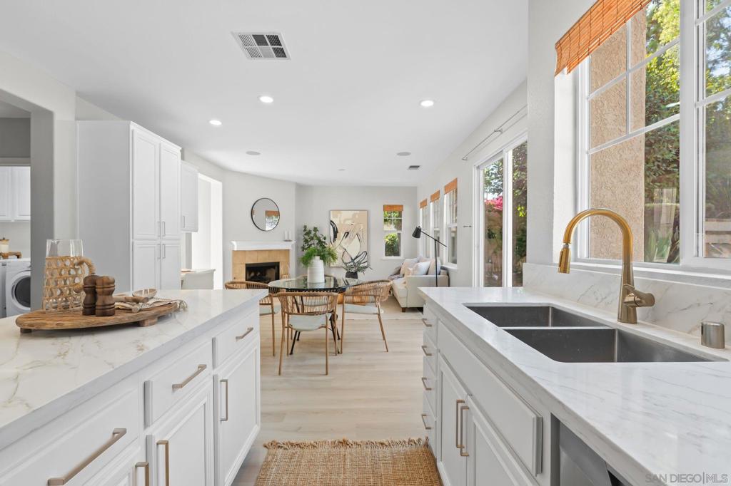 Tucked away at the end of a quiet cul-de-sac in San Elijo Hills’ Waterford neighborhood, this stylish 3-bedroom home is loaded with fresh upgrades. Enjoy new paint, flooring, countertops, sinks, lighting, mirrors, and more. The open-concept main level flows effortlessly from the living and dining areas to the kitchen and family room—perfect for gatherings. Upstairs features all three bedrooms plus a versatile loft easily converted into a 4th bedroom. The backyard is built for entertaining with a spacious layout and built-in grill. Close to parks, trails, and Town Square. Top rated local schools include San Elijo Elementary (top 10% in California), San Elijo Middle, and San Marcos High
