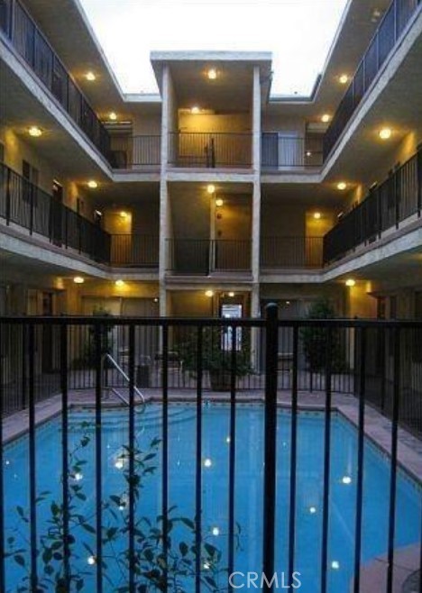 MOVE-IN SPECIAL PRICE IMPROVEMENT!! Beautifully 2 bedrooms/1.5 bath Condominium in a lovely community. 2 tandem assigned parking spaces under a cover carport in a lock gate with gate remote. It has almost 900 sf and is on the 2nd and 3rd floors in a secured building complex. Kitchen appliances include gas range/oven, dish washer, hood circulation vent and new garbage disposal. Coin laundry in the complex and the unit also has washer/gas dryer. Association pool and Gated parking. Walk across street to Home Depot. Public Transit nearby. Rent includes water and trash collection. MOVE-IN SPECIAL: FOR 12-MONTH LEASE, REGULAR $3200 MONTHLY RENT REDUCED TO $2570 PER MONTH WITH EARLY PAYMENT. SPECIAL REDUCED PRICE FOR A LIMITED TIME ONLY.