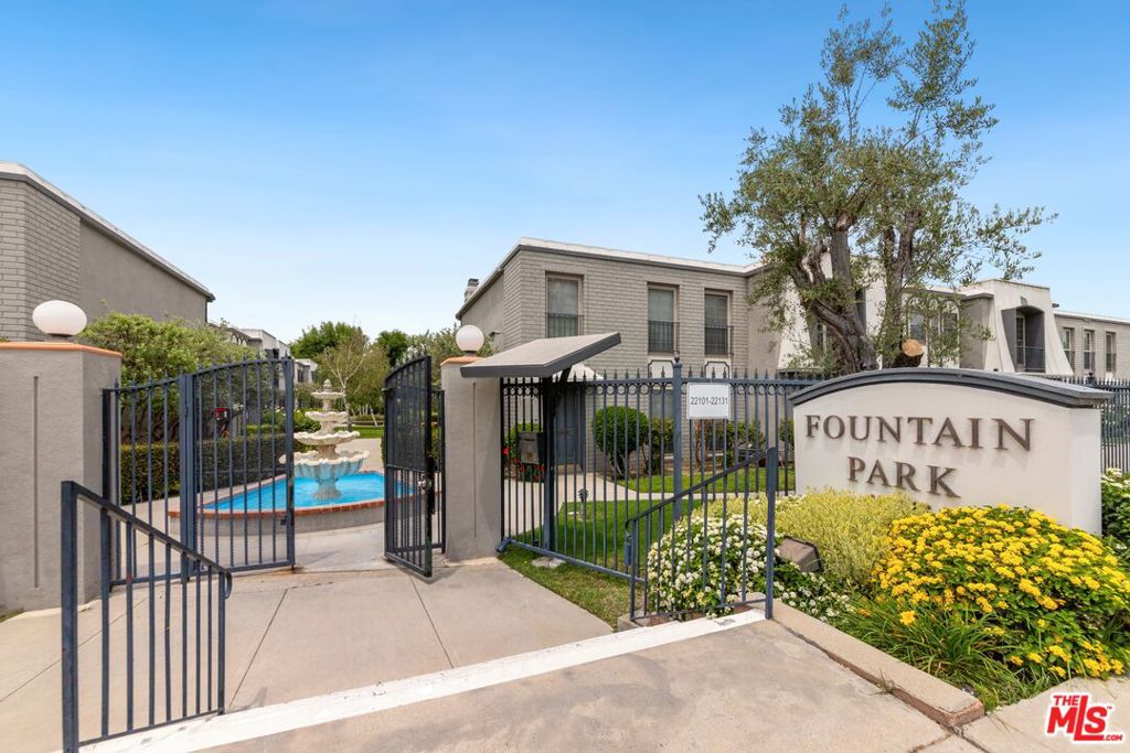 Experience living in this beautiful townhouse within Fountain Park, a serene gated community in Woodland Hills. This 2-bedroom, 1.5-bath home is truly move-in ready. The lower level offers a spacious living room, a well-appointed kitchen, and a dining area with laminate floor. A convenient half bathroom for guests and a dedicated laundry area with a private patio complete the downstairs. The patio features practical storage sheds for your convenience. Upstairs, both bedrooms are generously sized and connected by a functional Jack & Jill bathroom. Residents of Fountain Park enjoy an array of community amenities, including a playground, lush green areas, tennis courts, and basketball courts. Prime Location: This home boasts an exceptional location, just walking distance to The Village, Topanga Social, Westfield Promenade, 24-Hour Fitness, and UCLA Medical. Inclusions & CO-OP Details: Monthly fees are comprehensive, covering earthquake insurance, property tax, water, sewer, pest control, and all exterior maintenance. Ready to call this peaceful oasis home!