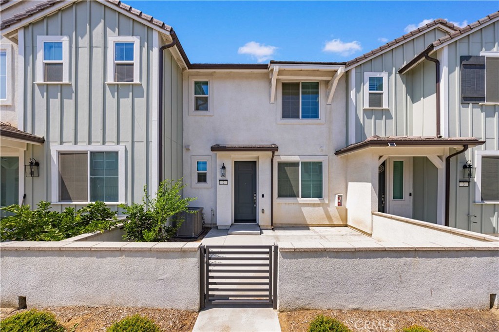 Welcome to this elegant 3-bedroom, 2.5-bathroom townhome features a private driveway that can accommodate up to four additional vehicles. Premium location just steps from the community pool, splash pad and playground. The interior offers a blend of comfort and style, with upgraded laminate flooring throughout the first floor and cozy carpeting upstairs. The kitchen is thoughtfully designed with modern cabinetry, quartz countertops, a decorative backsplash tiles, and stainless steel appliances—perfect for both everyday living and entertaining. Enjoy the benefits of fully paid-off solar panels, saving you money and supporting a sustainable lifestyle. Recessed lighting has been professionally installed throughout the ceilings, giving the home a modern, clean finish.The primary suite includes dual sinks, and a beautifully finished upgraded tile shower.Conveniently located just minutes from New Haven Market Place and within walking distance to 99 Ranch Market, Costco, and a variety of shops and restaurants. With quick access to the 60 , 15 and 71 freeways makes commuting a breeze.
Don't miss this opportunity to own a move-in-ready home in the premium location that offers comfort, convenience, and exceptional value.
