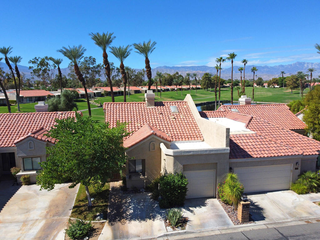 Nestled in the highly sought-after gated community of Palm Desert Resort Country Club, this beautifully upgraded 2-bedroom, 2-bath condo offers a rare opportunity for short-term rentals with Palm Desert city approval--making it an ideal investment or personal getaway. Enjoy breathtaking, unobstructed views of the western and southern mountains across two lush fairways, all from your private patio--perfect for relaxing or entertaining. Inside, the home features, stainless steel appliances, a cozy fireplace, and soaring ceilings that create a bright, airy ambiance. Residents and guests have access to world-class amenities including an 18-hole golf course, sparkling pools, and top-tier pickleball and tennis facilities, all in a vibrant desert setting. This is resort living at its finest.