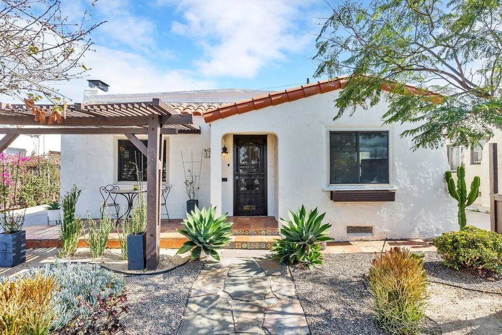 Charming Spanish-Style Home in the Heart of North Park Welcome to this beautifully maintained 2 bedroom, 1 bathroom Spanish-style gem, perfectly situated in the highly sought-after North Park community. This single-story home blends timeless character with thoughtful modern upgrades—featuring original wood flooring, a remodeled kitchen, updated fireplace, and stylish exterior doors. Enjoy year-round comfort with central A/C and heat, plus peace of mind with a new tankless water heater (2024), French drains, and new turf installed in 2024. Step outside to relax on the cozy front porch or entertain in the private backyard, complete with a freshly built patio and pergola—perfect for gatherings or quiet mornings. Additional highlights include a one-car detached garage with laundry, gated off-street parking, and a fenced front yard ideal for pets or play. Just a short walk to 30th Street, Adams Avenue, and all of North Park’s popular shops, bars, and restaurants. With quick access to the 805 freeway, this location offers both convenience and lifestyle. Don’t miss this rare opportunity to own a character-filled home in one of San Diego’s most vibrant neighborhoods!