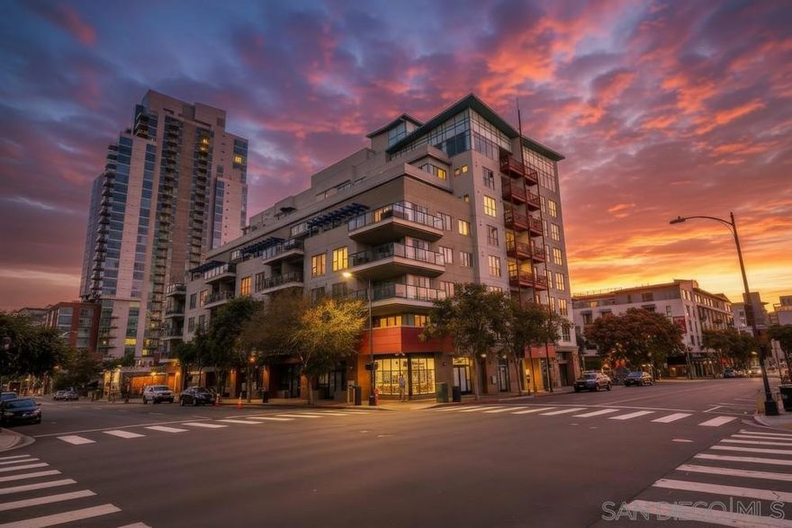 NEWLY REFRESHED ONE BEDROOM IN NEXUS WITH A GENEROUS "TWO ZONE" BALCONY IN THE EXCITING EAST VILLAGE! Just painted in OCTOBER 2025! New LARGE CAPACITY front load washer & dryer October 2025!  Updated light fixtures and freshly painted two tone kitchen cabinets. New bedroom carpet. Engineered wood flooring. Fantastic location just 3 blocks from Petco Park, a short hop to the dynamic Gaslamp District & all of Downtown with scores of fantastic restaurants & shops. NEXUS HOA amenities include a modernist lobby with mail and package delivery, a fitness room, a secure bike storage room, one assigned parking space in the gated underground lot, and a rooftop patio with barbecue & great city views. THIS ONE IS MOVE IN READY.....MAKE IT YOURS TODAY!!
