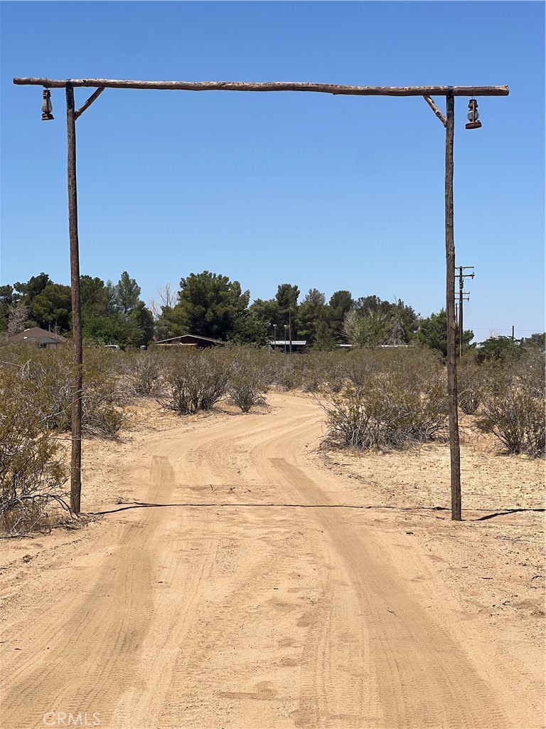 Flat usable 1.53 Acres with power close. Gorgeous views and room to build your dream home! Close to shopping and schools.