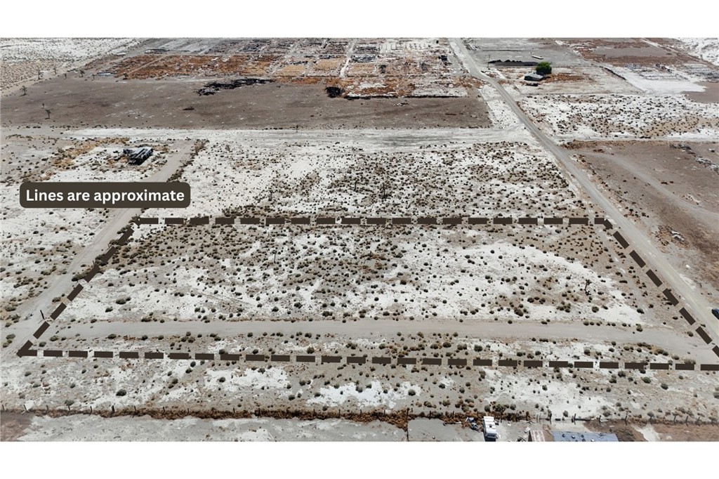 4.83 Acres (APN: 0457-073-57) GPS: 34.613345, -117.646427 This 4.8 acre property is located in El Mirage near the city of Adelanto, CA. The property is zoned Rural Living (RL). While primarily designated for residential use, the zoning also permits accessory crop production and agricultural structures. Overhead power is approx. 1000 ft east along Markham St. Additionally, flood maps confirm that the property is not within the 100, 200, or 500-year flood plains. El Mirage, CA offers the perfect blend of high-energy adventure and peaceful desert living. Known for its expansive Off-Highway Vehicle (OHV) area, it's a hotspot for outdoor enthusiasts who enjoy ATV riding, 4x4 trails, land sailing, and camping. At the same time, El Mirage's wide-open landscapes and star-filled skies provide a quiet escape for those seeking tranquility and a slower pace of life. Whether you're looking for adrenaline-fueled fun or serene moments in nature, El Mirage delivers a unique lifestyle that caters to both. This property does not yet have an address. While the boundary lines on the map offer a glimpse, they are only approximate. A Buyer should verify boundaries, zoning and utilities, ensuring every aspect aligns with their vision for the property.