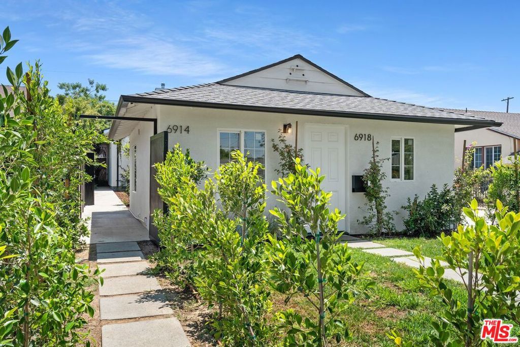 You've come to the right place if you're seeking a true compound and private retreat. As you approach the property, you're greeted by a remodeled main home along with two newly added ADUs, creating a unique opportunity for steady rental income. This is truly a rare find. The entire compound offers 6 bedrooms and 4 bathrooms, making it ideal for extended families, multi-generational living, or investment purposes. With so many options, all you have to do is choose the one that's right for you. The main house features 3 bedrooms and 1 bathroom, blending charm with modern updates. The converted garage unit impresses with its brightness, unusually large front yard, and generous size bedroom and bath.. The primary 2 bedrooms/2 bathrooms ADU is the showstopper with soaring 10-foot ceilings, open-concept living room, and designer finishes throughout. Each unit has its own private address, washer/dryer, and separate outdoor area, creating a sense of individuality and privacy throughout the property. This is more than a home, it's a lifestyle. Whether you're looking for , a family haven, or an income-producing property, this compound can be as versatile as you want it to be. 2111 sq feet represents the square footage of the 3 homes on the property. Walking distance to the library, 3 parks , a sparkling Olympic size pool and the Valley Plaza Recreation Center! All units to be delivered VACANT! All units have their own washer and dryers too!