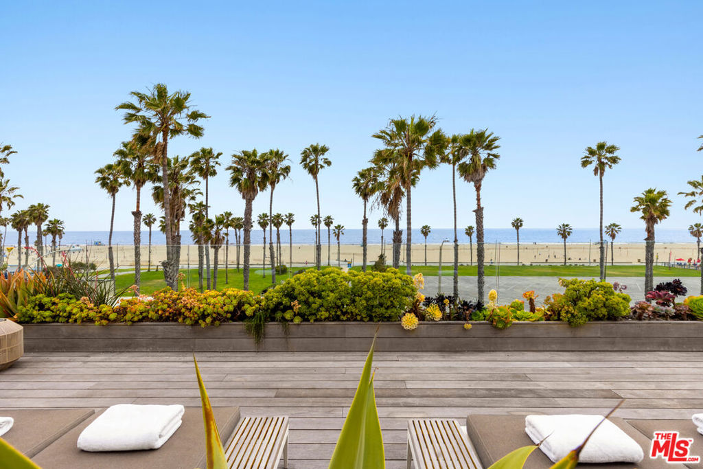 Experience the epitome of coastal living at 120 Hart Ave. Enjoy captivating, direct ocean views from the comfort of your home while being ideally situated on Santa Monica's desirable walk streets, just moments away from the sandy beach, and all of Santa Monica's iconic offerings. This luxurious FULLY FURNISHED beachside retreat was taken down to the studs and rebuilt in 2022 with the highest quality, craftsmanship and design. The home boasts breathtaking ocean views spanning from Catalina to Malibu, while experiencing privacy at its finest. Discover an expansive state-of-the-art Henrybuilt kitchen featuring a Lacanoche stove, bespoke cabinetry, and a large center island. Adjacent, find an outdoor deck conveniently fit with a pizza oven and Wolf barbecue. No detail was spared with two Subzero refrigerators/freezers, dual Cove dishwashers, a Miele espresso machine and a Uline wine fridge. The adjoining open-concept living and dining area is designed for entertaining or relaxation while soaking up the palm trees and ocean view. Floor-to-ceiling windows flood the space with natural light which compliments the warmth of the walnut Madera floors, creating an unrivaled seaside sanctuary. The lavish primary suite highlights exquisite custom cabinetry, walk-in closets and an adjacent spa-inspired bath. Retractable glass doors open to a lush, private outdoor oasis complete with a modern fireplace, outdoor shower and built-in cold plunge and hot tub. The home presents three additional en-suite bedrooms, five bathrooms, a cutting-edge home office and gym (optional fifth bedroom). Throughout the home, find Electric Lutron shades providing utmost privacy and convenience as well as an elevator granting access to every level. The vast 1,500-square-foot rooftop deck is where an entertainer's paradise awaits. Bask in the panoramic views of the Pacific coastline while soaking in the marvelous plunge pool or indulge in alfresco dining amidst the endless amenities such as a Wolf barbecue, refrigerator, custom tailored awnings, Tucci umbrellas, heaters, fire pit and an expansive lounge and dining area. A perfect location to end each day while admiring the stunning sunsets. A spacious four-car garage, dedicated laundry and mud room complete the home. Enjoy unparalleled access to the beach and Main Street's coveted dining and shops by making this coastal retreat your next home. ***Seller was going to wait until March to put the house on the market, but knowing how many people are in dire need at this time, he is listing it sooner in hopes of helping. The house can allow for immediate sale/occupancy.***