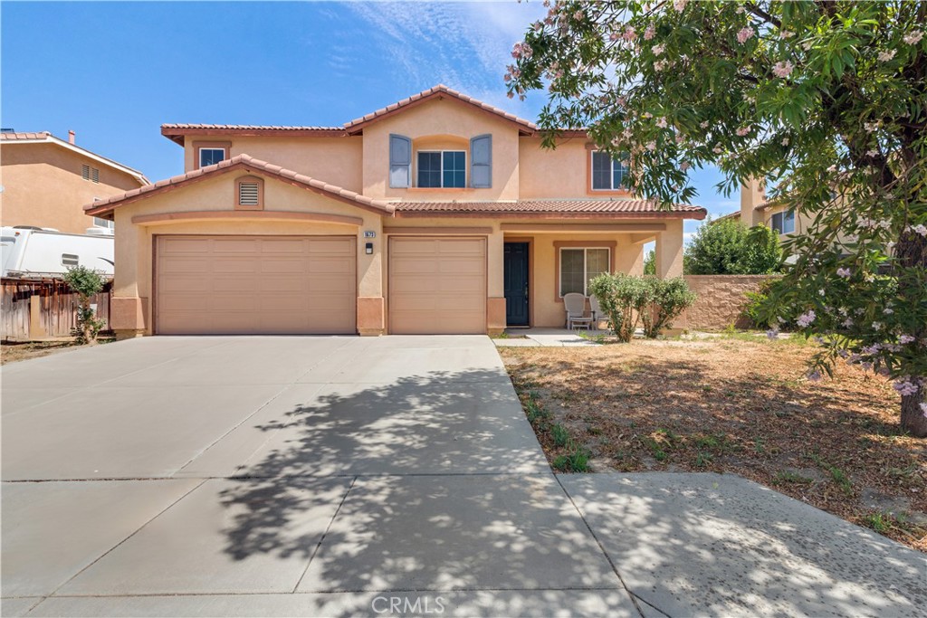 A 5-bedroom, 2.5-bath home offering over 2,600 square feet of spacious living in the heart of San Jacinto. Built in 2005 and recently updated with new laminate wood flooring upstairs, this two-story residence features an impeccably maintained and clean interior throughout. Ideal for those seeking space, comfort, and exceptional value in San Jacinto’s competitive market.
The home welcomes you with multiple living areas, enhanced by stylish tile flooring on the main level and large windows that fill the space with natural light. The well-appointed kitchen, featuring classic white tiled countertops, a convenient center island, ample cabinetry, and a spacious pantry, presents a clean canvas for your culinary dreams or future personalized upgrades.
Downstairs also features a versatile bedroom and bathroom, ideal for accommodating guests, creating a productive home office, or supporting multi-generational living. Upstairs, you’ll find four additional generously sized bedrooms, including a spacious primary suite featuring a luxurious soaking tub, separate shower, dual sinks, and a walk-in closet – a true private retreat. Other highlights include a large open den, perfect for a media room or play area, and a full-size laundry room conveniently located upstairs. This home also features a two-car garage for ample parking and storage, as well as a sprawling backyard with endless potential for landscaping, entertaining, or even adding a sparkling pool to create your oasis.
Beyond the walls of this inviting home, you’ll discover a neighborhood that truly enhances your lifestyle. Enjoy the convenience of being just moments away from Bolander Park, a fantastic local amenity with a jungle gym, picnic areas, and basketball courts – perfect for family outings. For those who love the outdoors, the majestic Mount San Jacinto State Park offers breathtaking hiking trails and natural beauty just a short drive away.
Move-in ready with abundant room to personalize, this is an incredible opportunity to create your dream home at a remarkable value in a growing community.