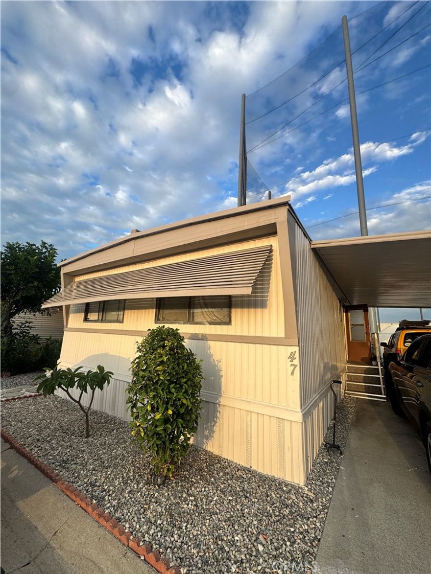 Excellent Investment Opportunity!This charming mobile home is perfect for investors looking for a great flip or for anyone ready to create their dream home. It features 2 bedrooms and 1 bathroom, with a nice-sized backyard and a two-car carport for convenience. Ideally situated near the entrance of the community, this property offers easy access and everyday convenience. Enjoy beautiful sunset views from your own yard and envision the potential this home has to offer. With a little TLC, you can transform this property into a cozy retreat or a profitable investment — the possibilities are endless!