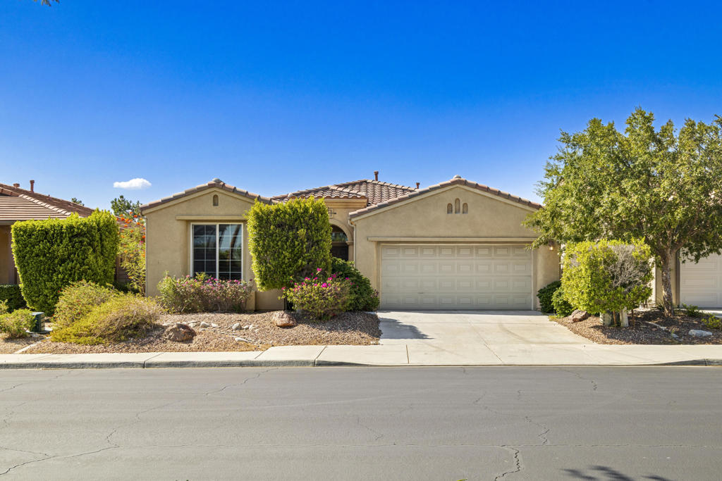 Don't miss this incredible opportunity in beautiful Palm Springs! Imagine starting your mornings with coffee on the covered patio, soaking in those breathtaking mountain views. This spacious 3 bedroom, 2 bath home has a comfortable, open feel with a cozy fireplace in the living room, kitchen with center island and plenty of cabinet space, plus a separate dining area. You'll enjoy the convenience of the indoor laundry room complete with sink and the two-car garage for parking and extra storage.The enclosed back yard is just the right size - manageable, charming and perfect for relaxing or entertaining.All of this is tucked inside Four Seasons, a 55+ gated development where you can enjoy the community pool, tennis courts, BBQ/picnic area and fitness center. Resort-style living all year long!