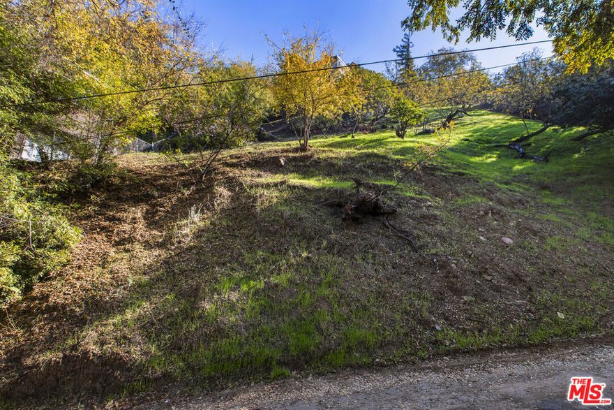Rare opportunity to own 5,199 sq ft of vacant land in the desirable Mount Washington/Glassell Park area of Los Angeles. This hillside lot (APN 5464-001-035) is zoned RE11-1-HCR and located within the Mount Washington/Glassell Park Specific Plan and Hillside Construction Regulation District, offering excellent potential for a custom single-family home. Surrounded by established residences, the site sits in a peaceful canyon setting with natural terrain and possible hillside views. Ideal for builders, architects, and investors seeking a Los Angeles development opportunity. Nearby utilities and street access on Ganymede may support future construction; however, buyer must independently verify all utility availability and connection requirements with LADWP, LA Sanitation, and all appropriate agencies. Buyer to verify zoning, Specific Plan guidelines, hillside restrictions, grading requirements, fire-zone regulations, environmental conditions, driveway access, setback requirements, and all development standards with the City of Los Angeles. Lot size, boundaries, and buildability to be confirmed by buyer through survey, geotechnical report, and professional investigations. Seller and broker make no guarantees or warranties. Buyer to conduct all due diligence. A prime LA hillside parcel perfect for a custom home project or long-term investment.