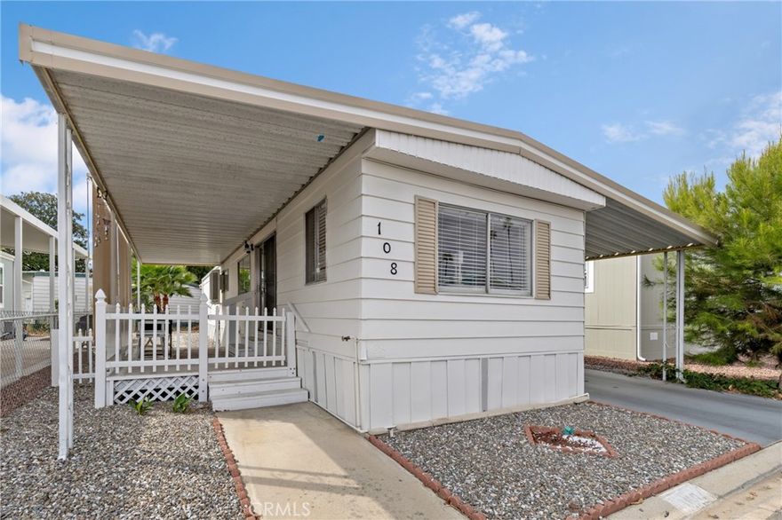Absolutely turn-key-adorable mobile home in Colonial Country Club senior rental park. Cozy living area with laminated wood flooring and sliding glass door to raised front porch. Re-plumbed and freshly painted inside and out. New interior panel doors, hardware, upgraded light fixtures, and 2" blinds. Upgraded kitchen with 4-burner gas stove, granite-look Formica counter tops, decorative tin patterned backsplash, stainless sink, and refrigerator. Main bedroom has sliding barn-style closet door. Second bedroom is perfect for home office or hobby room with open closet and built-in storage. Remodeled bathroom boasts enlarged shower stall, vanity, and space for stackable washer and dryer. Colonial Country club is conveniently located near major shopping centers, restaurants, and services and offers loads of recreational options for residents including pool, pickle ball courts, and on-site golf course!