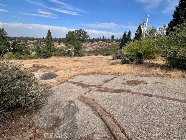 Don’t miss this opportunity to own a .37-acre lot in one of the area’s most desirable neighborhoods. Nestled on a quiet and well-kept street, this property offers the perfect balance of peaceful surroundings and convenient location. With a gently sloping terrain and plenty of space to design your dream home, this lot provides endless possibilities, whether you’re envisioning a custom build, an investment property, or a private retreat. Enjoy sweeping views that create the ideal backdrop for outdoor living and relaxing evenings. Utilities are nearby, and the lot’s size allows for both comfort and creativity in your build. Properties in this sought-after area rarely come available—this is your chance to secure a piece of land in a community known for its appeal, charm, and long-term value.