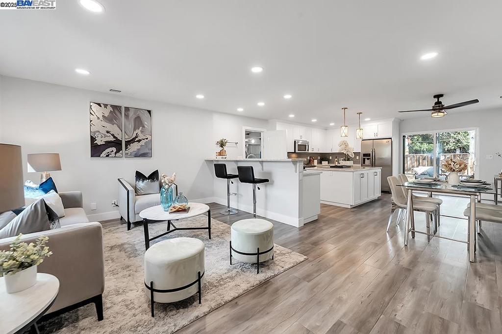 Nestled in a quiet and convenient Sunnyvale neighborhood just minutes from downtown, this beautifully expanded and fully remodeled 3-bedroom, 2-bath luxury home offers modern living at its finest. The open-concept design features a spacious kitchen with a large island, breakfast bar, and sleek new materials throughout. Natural light fills the living areas, creating an inviting space for everyday living and entertaining. The thoughtfully designed floor plan includes a private primary suite with a walk-in closet and a spa-like designer bathroom. One of the additional bedrooms features a convenient fold-away Murphy bed, making it perfect for guests or a home office. Step outside to enjoy the beautifully landscaped front yard, complete with a charming fruit tree, and a large backyard oasis featuring a new deck, raised planter boxes, and festive outdoor lighting—ideal for relaxing or hosting gatherings. With a prime location, modern updates, and a peaceful neighborhood setting, this move-in-ready home is a rare find!