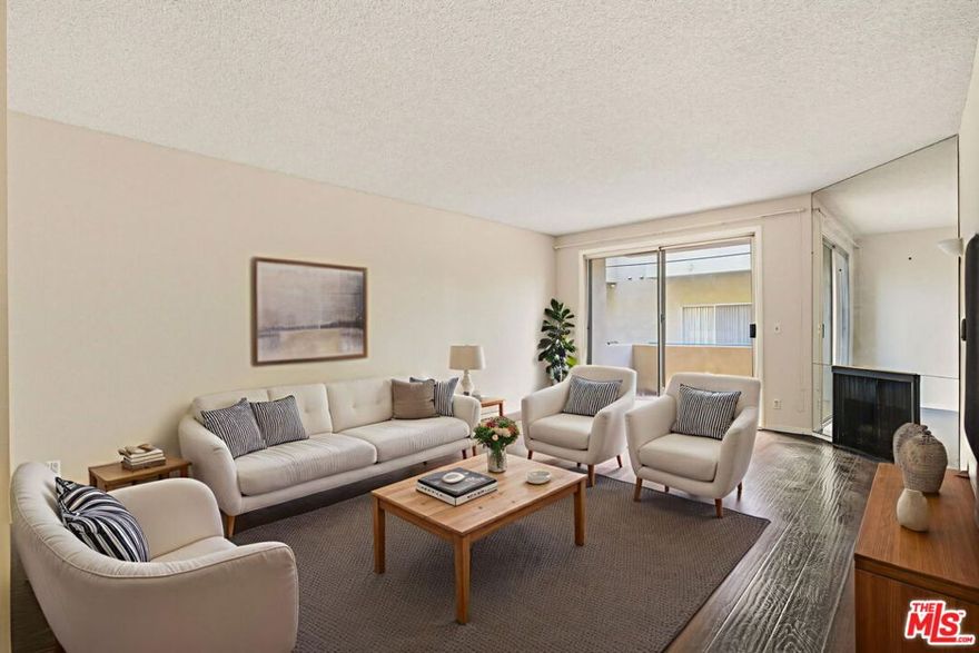 Discover urban living in this well designed 2-bedroom, 2-bathroom condominium, featuring a versatile den/office that can serve as a third bedroom. Step into a bright and expansive living and dining area, accentuated by a cozy fireplace, creating an inviting ambiance for both entertaining and relaxation. The sunny kitchen has the added convenience of an in-unit washer/dryer. The spacious primary suite offers a large walk-in closet and a bathroom, complete with dual sinks, a separate shower, and a soaking tub. The second bedroom provides a private retreat. Storage abounds with two hallway closets, generous in-unit space, and additional storage in the secure garage. This lovely unit is nestled within a secure, elevator-equipped building featuring amenities, including a large recreation room, community pool, and spa. The gated garage offers convenient 2-car tandem parking. Ideally located moments from Westfield Century City Mall, Beverly Hills, the acclaimed Westwood Charter Elementary School, and an array of fine dining and shopping, this home embodies the best of Westside living.