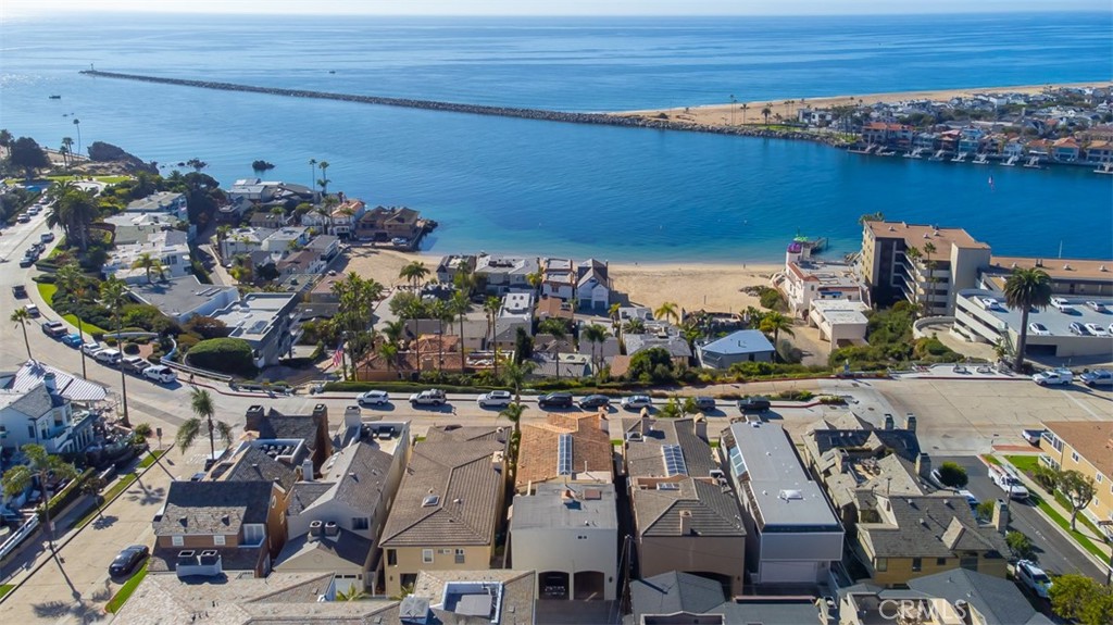 MASSIVE PRICE REDUCTION!!! Wake up to the sound of the ocean, watch the sunsets paint Catalina in gold, and let your property work for you - because with this opportunity, you get it ALL!
Rarely do duplexes open up on CDM's Ocean Blvd. Rarer still are ones with views like this and just moments away from Corona del Mar’s village shops, restaurants, Fashion Island, Lido Marina Village, and award-winning schools.
Built in the early 90's, this two story duplex boasts a 2 bedroom ground-floor unit and a 3 bedroom 2nd floor unit with a rooftop deck. Two car garage plus covered tandem parking for two more cars PLUS street front parking means you and your guests are never far from the breathtaking views of the Jetty, China Cove and the spectacular Catalina Island sunsets you'll be toasting from your deck or patio.
Best of all, this duplex has two separate APN's (meaning that you could remodel one or both & sell them off separately).
Fix & Flip, remodel, rebuild, renovate or just rent - all are great choices for this phenomenal CDM duplex opportunity!