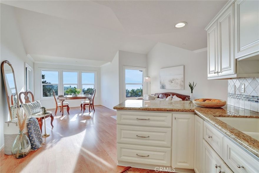 Don’t miss this upgraded 2-bedroom, 2-bath home with amazing ocean, Catalina, and sunset views! This bright and open unit has been freshly painted and features new dual-pane windows, crown molding, window casings and LVP flooring throughout. The kitchen includes stainless steel appliances, and the living space opens to a private balcony where you can relax and take in the beautiful scenery and views.
Enjoy the peaceful, park-like setting surrounded by streams and ponds, plus great community amenities like a pool and jacuzzi. The location can’t be beat—close to hiking and biking trails, great schools, shopping, restaurants and Lifetime fitness. Property also offers RV parking.
It’s the perfect spot to enjoy Southern California living at its best!