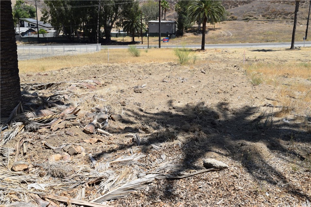 Here's a nice flat lot in the Country Club Heights area of Lake Elsinore. This lot is conveniently located near Hwy 74 (Riverside Dr) for easy access for your commute. Beautiful Palm Trees line this portion of Shrier Dr, making a perfect setting for your home. This area is right in the path of progress!