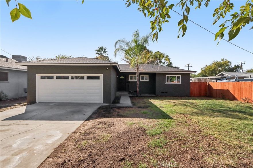 Beautifully Remodeled Single-Level Home! Step inside this completely renovated residence featuring fresh interior and exterior paint, new vinyl wood flooring throughout, and an inviting open-concept layout. The upgraded kitchen showcases crisp white cabinetry, quartz countertops, a large center island, and stainless steel appliances—perfect for entertaining. The home offers both a spacious living room and a cozy family room, each with its own stunning fireplace. The primary suite includes a remodeled ensuite bathroom, while three additional bedrooms are served by two beautifully updated bathrooms. Enjoy outdoor living in the expansive backyard with a concrete patio and lush lawn area. Additional highlights include a two-car attached garage and a convenient location close to parks, schools, shopping, and major commuter routes.