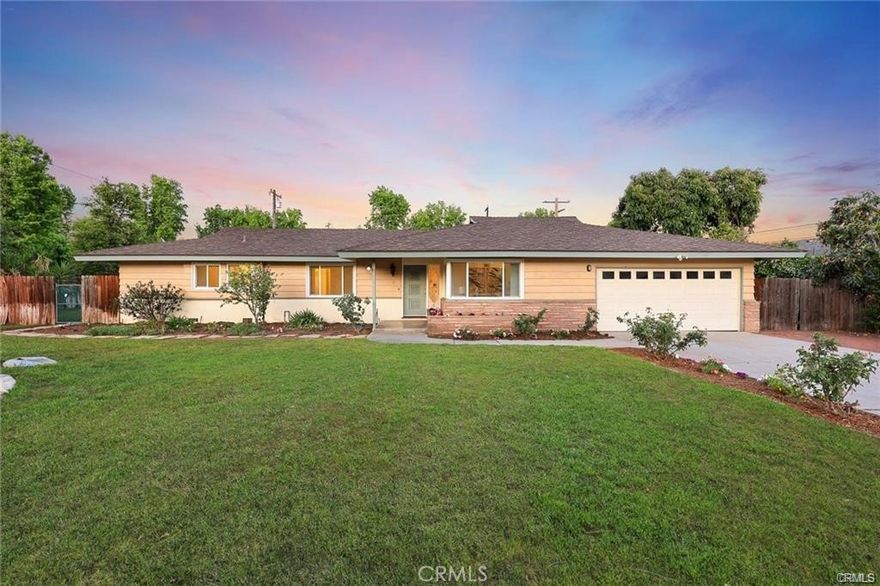 (Wide Frontage Of 131 x Depth 122 FT) A charming single-family home built in 1957,fantastic open floor plan offering a blend of classic design and modern comfort. The home boasts a Craftsman architectural style, characterized by its attention to detail and quality craftsmanship. Upgraded in 2015. including new Double pane windows,, New Garage Door, pristine Hardwood floors, Recently Fresh new paint interior, and much much more! Lovely cute covered patio was built along the rear of home, Kitchen was totally remodeled with new Stainless steel appliances, luxurious counter tops and premium quality cabinets. Family room features a lovely fireplace. Situated in a tranquil neighborhood, the property offers a wide backyard with a patio area, perfect for outdoor gatherings and relaxation. The location provides easy access to local amenities, schools, and parks, making it an ideal choice for families.