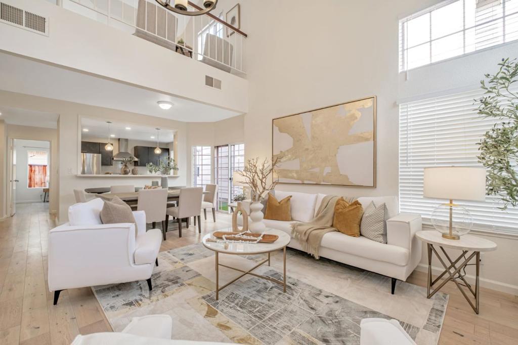 This is the one youve been waiting for! Loaded with upgrades, this beautiful NE-facing home offers 2 bedrooms plus a spacious loft/office that can easily be converted into a 3rd bedroom, along with 2 full baths. Designed for entertaining, the open layout features a large living and dining area, luxurious wood flooring, and a remodeled kitchen with stainless steel appliances. Upgraded bathrooms, fresh interior paint, new light fixtures, and a low-maintenance backyard add to the appeal. HOA fees include greenbelt landscaping, trash removal, and garage maintenance, while community amenities feature a pool and playground. Enjoy a prime location with a high walk scoreApple, Facebook, and Google shuttle stops are nearby for an easy commute. Just minutes from freeways, shopping (NewPark Mall, Costco, Target), dining, parks, and top schools. Easy access to 880/84 makes this home as convenient as it is inviting. Come see this versatile, move-in ready home today!