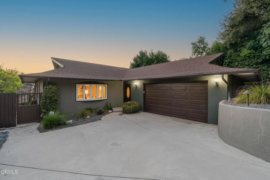 Tucked into a quiet hillside street, this home offers beautiful views that stretch over the Jet Propulsion Laboratory and the San Gabriel Valley. This well-cared-for home features warm hardwood floors, great natural light, and an easy-flowing floor plan that connects the main living and dining areas. The kitchen includes granite countertops, double ovens, and a central island--ideal for everyday use or casual hosting. Large windows throughout the home bring in light and showcase the expansive views. The backyard has been updated with drought-tolerant landscaping, offering a low-maintenance space to relax, garden, or take in the sunset. Located close to trailheads, parks, and Altadena's local shops and cafes, the home sits in a peaceful neighborhood with a strong sense of community. A great option for anyone looking for comfort, quiet, and views in the foothills.