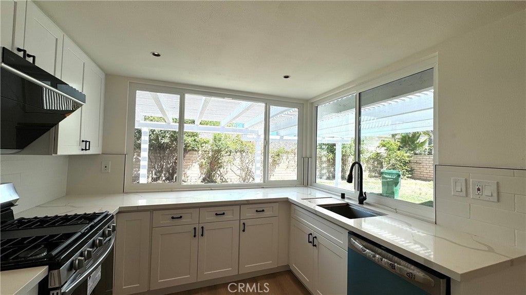 Photo of 15451 Alsace Cir CIR, Irvine, CA 92604 (MLS # OC26214595)