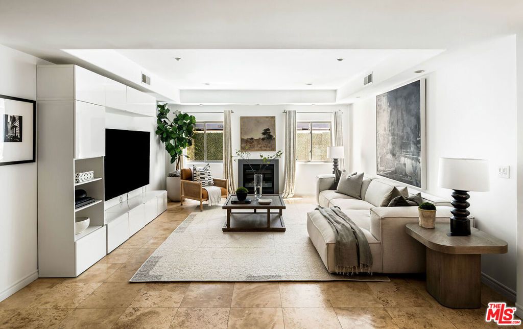 Photo of 11633 Chenault Street #102, Los Angeles, CA 90049 (MLS # 25591101)