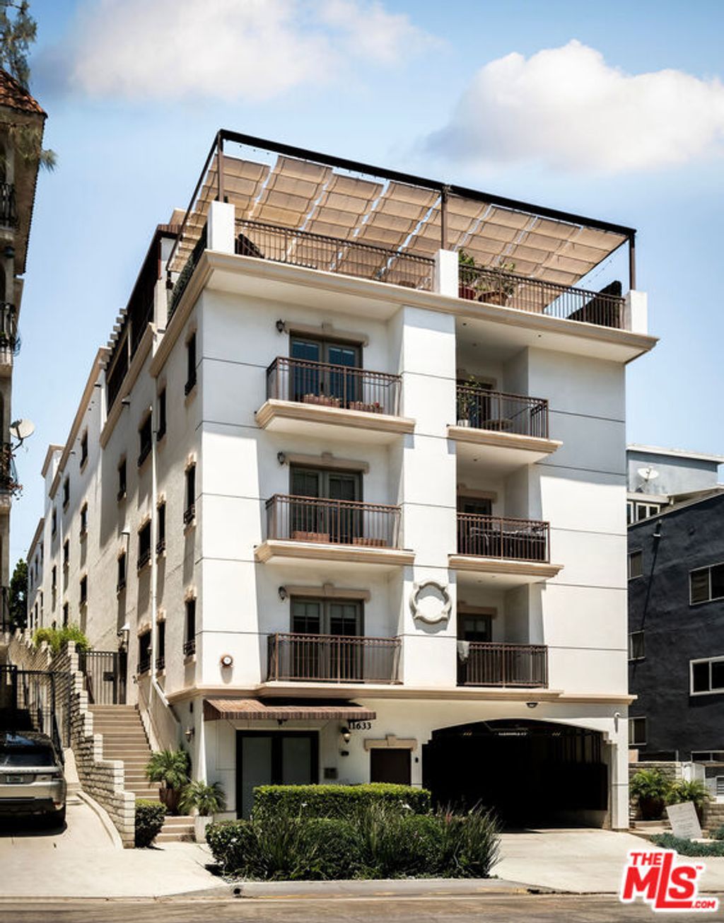 Photo of 11633 Chenault Street #102, Los Angeles, CA 90049 (MLS # 25591101)